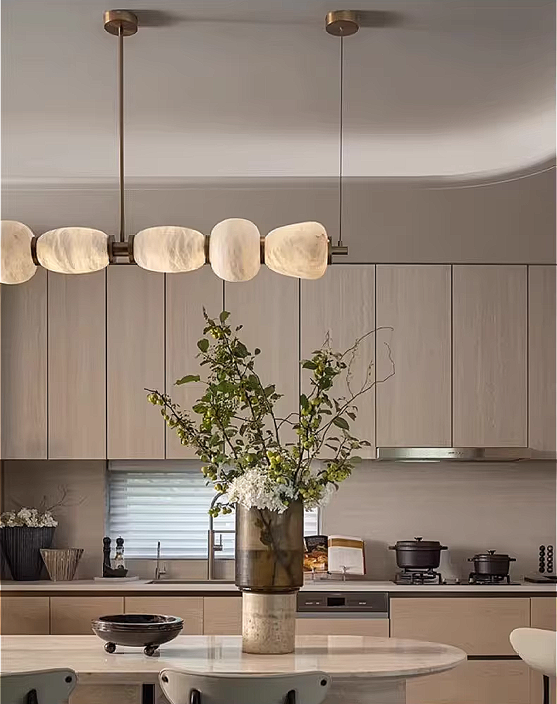 Alabaster linear chandelier in a neutral modern dining room interior