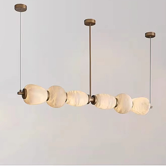 Spanish alabaster linear chandelier with a copper frame in a modern interior