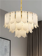Sculptural alabaster chandelier hanging over a contemporary dining room with modern luxury styling