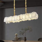 Alabaster linear chandelier in contemporary dining room, gold sculptural lighting fixture in modern architectural space