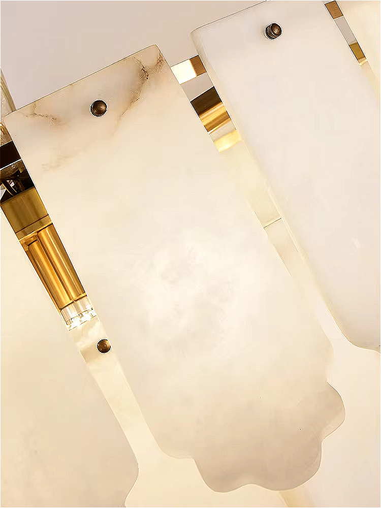 Drum-shaped alabaster chandelier illuminating a modern living room interior