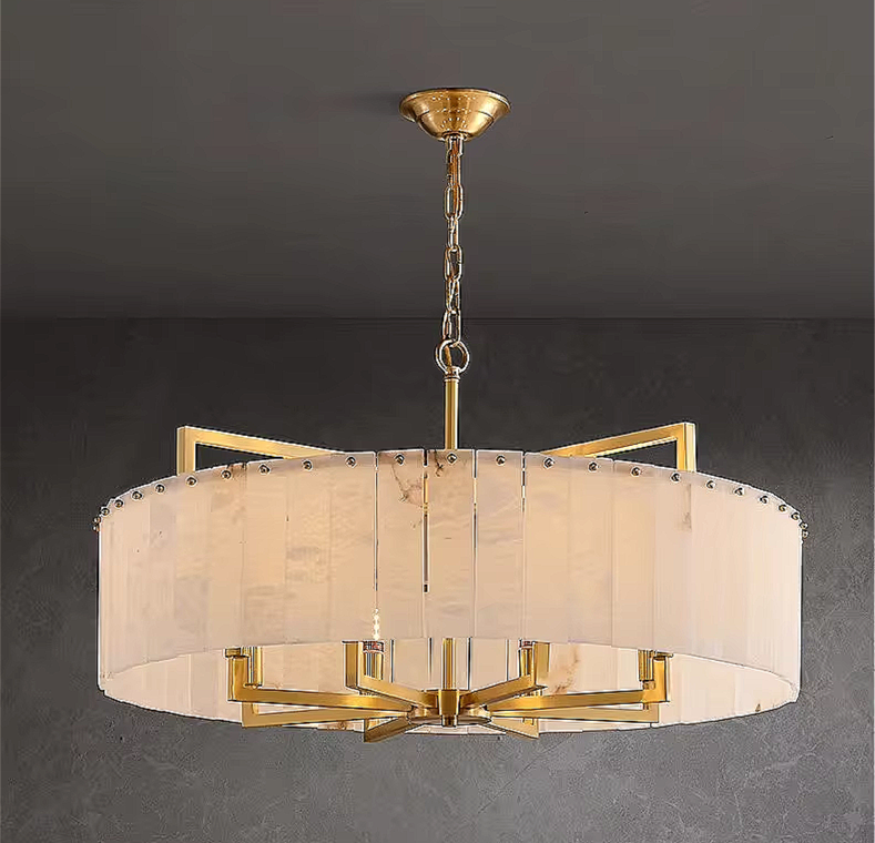 Gold alabaster chandelier in a modern luxury dining room interior