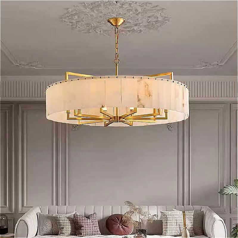 Gold alabaster chandelier in a modern luxury living room interior