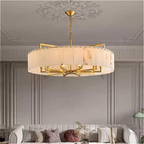 Gold alabaster chandelier in a modern luxury living room interior