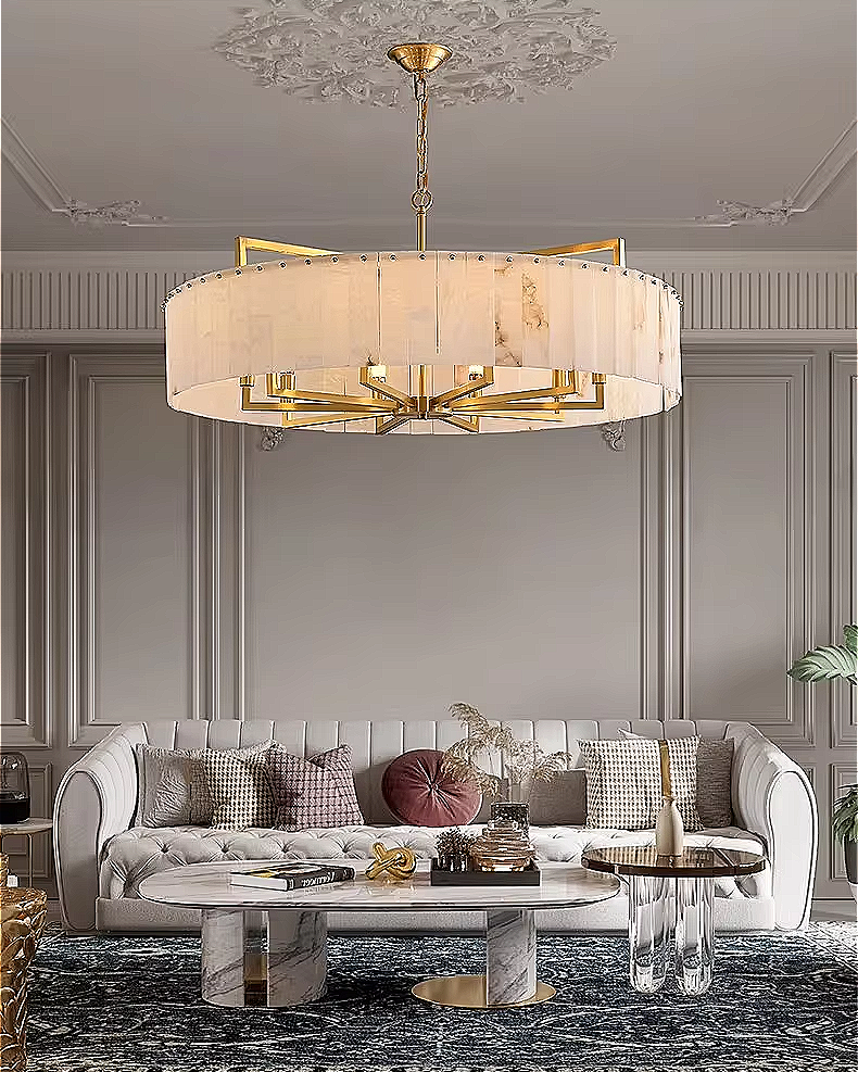 Gold alabaster chandelier in a neutral luxury interior with soft ambient lighting