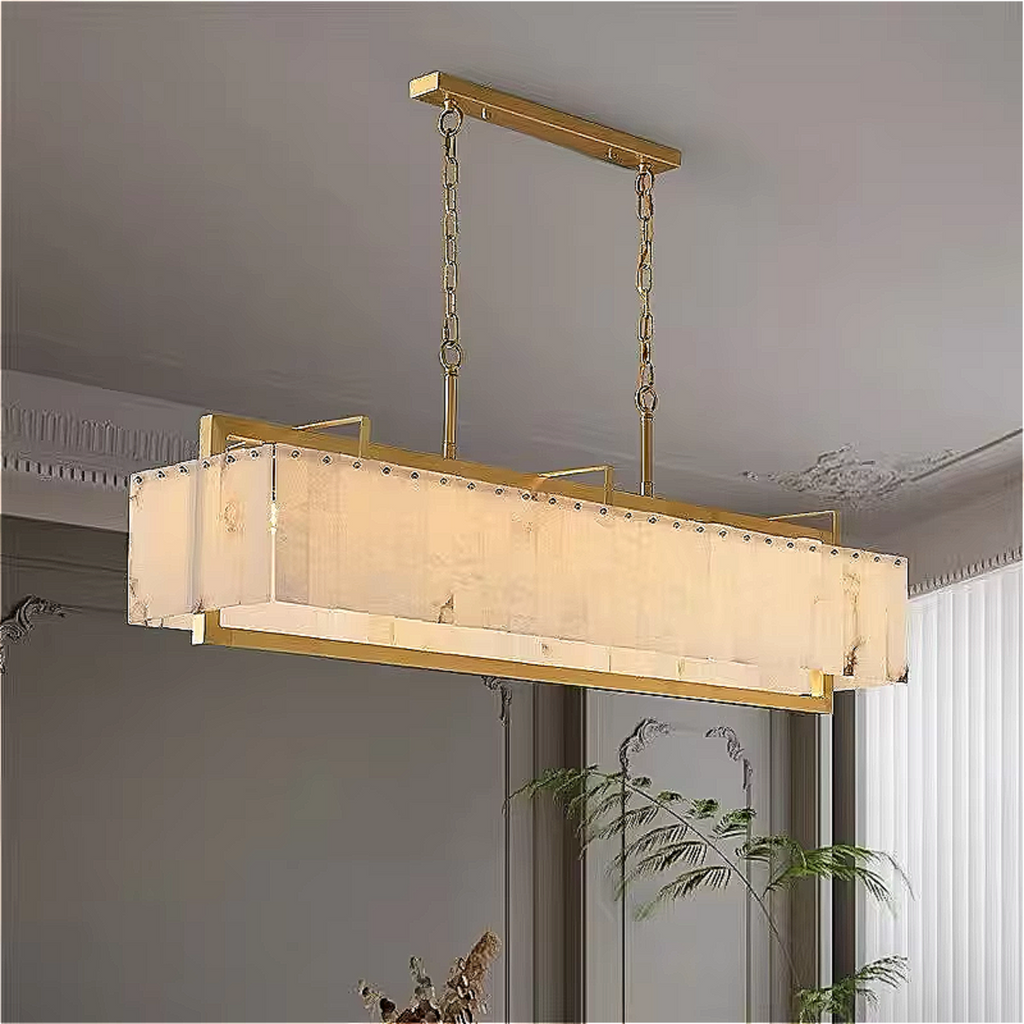 alabaster linear chandelier in quiet luxury dining room with refined neutral interiors