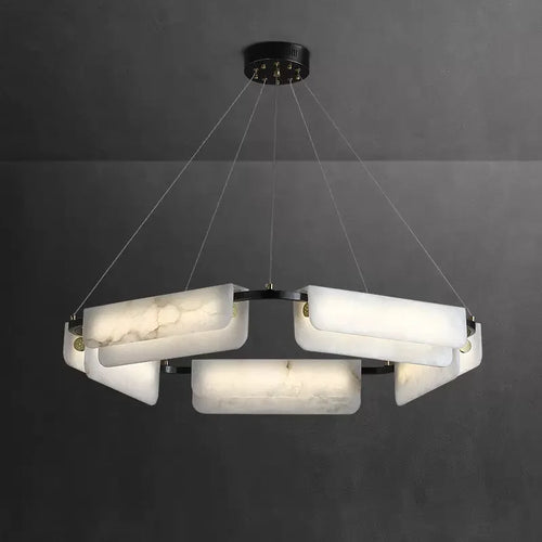 Modern round alabaster chandelier in a black contemporary interior