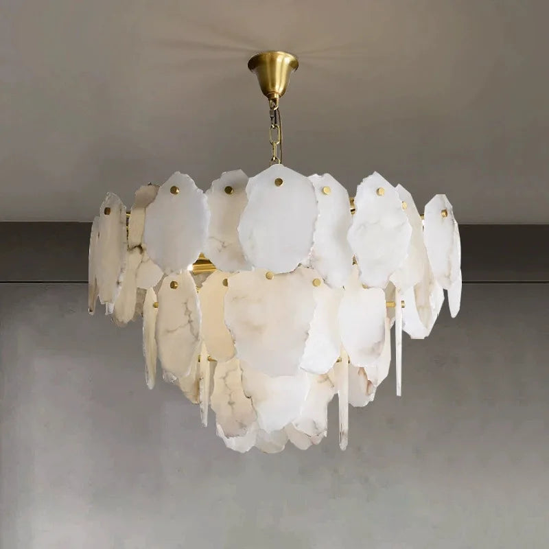 Natural stone alabaster chandelier detail showing hand-cut stone veining and soft light diffusion