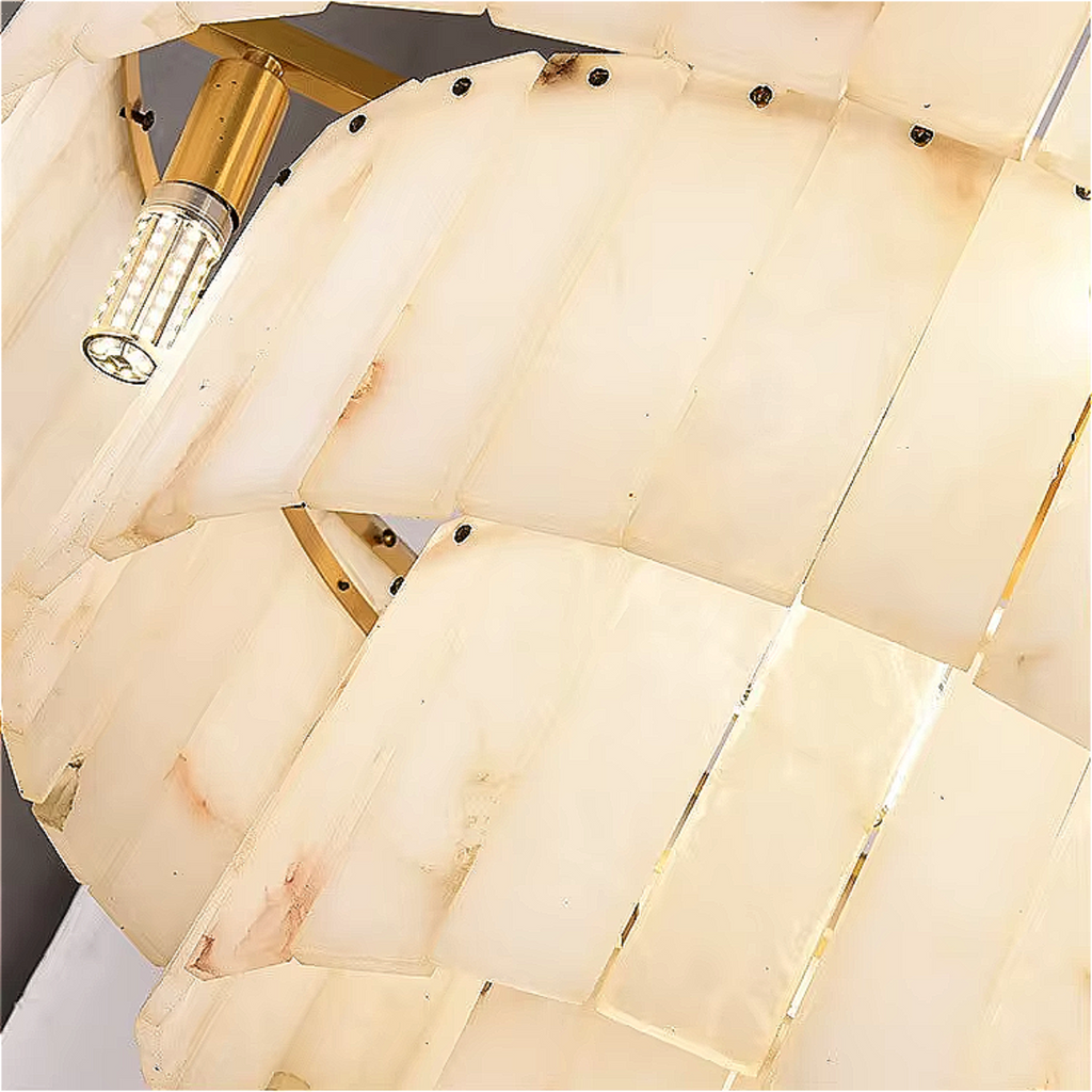Close-up of white alabaster chandelier highlighting layered stone texture