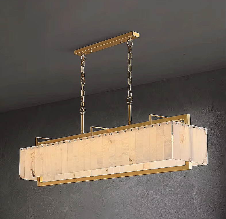 modern rectangular alabaster chandelier in contemporary dining room with sculptural gold lighting