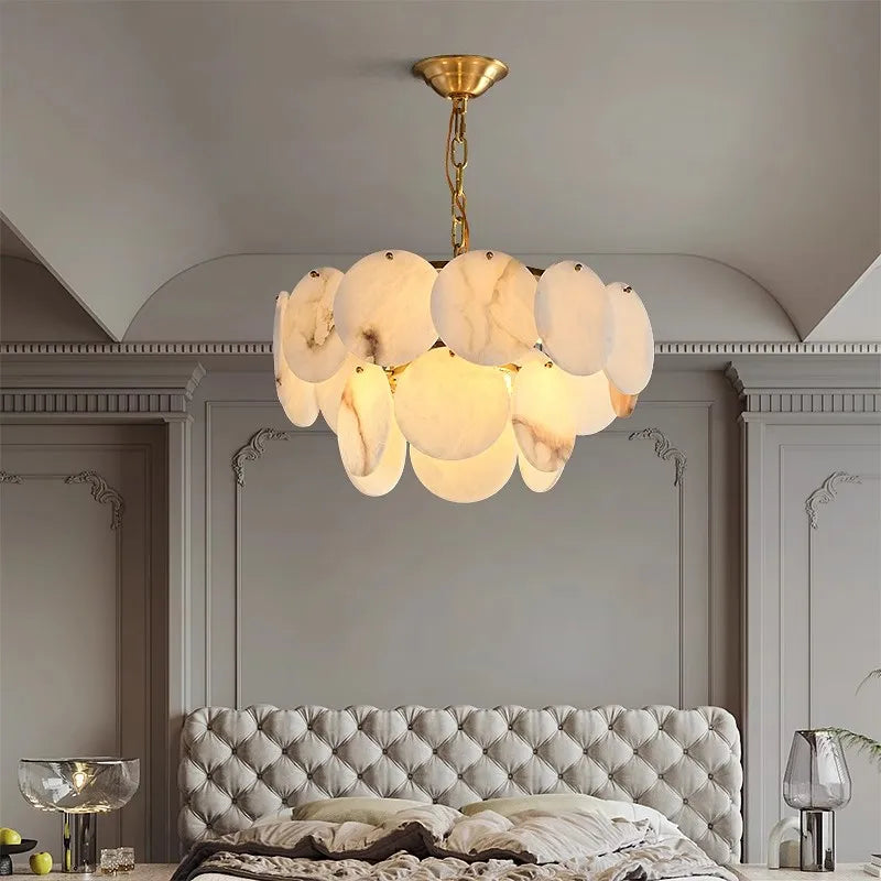 2-tier spanish alabaster chandelier styled in a luxury bedroom with soft natural stone lighting