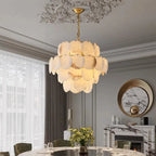 4-tier spanish alabaster chandelier above a modern luxury dining room in natural stone finish